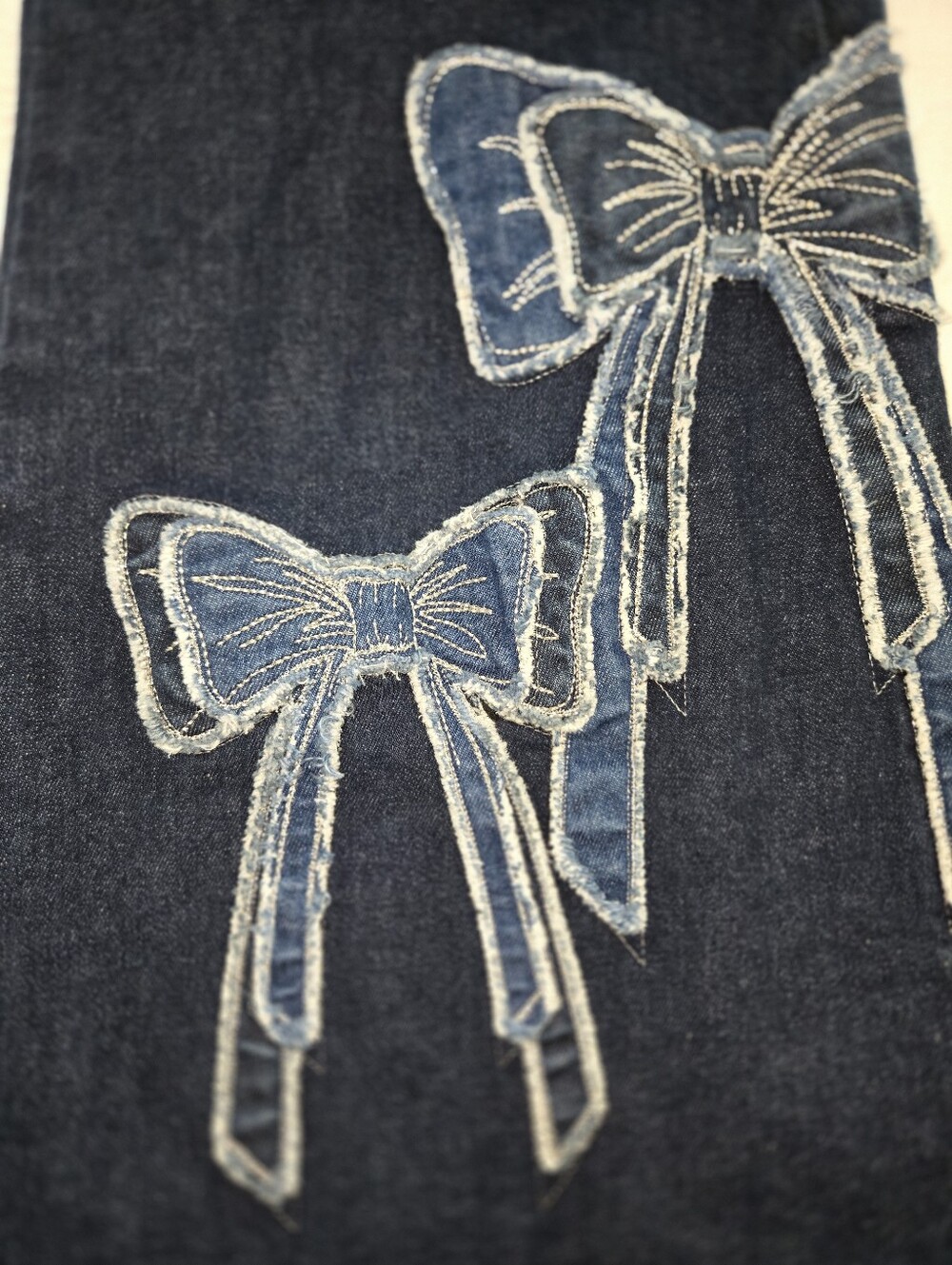 DRIFTWOOD Dark Indigo Embroidered Bow Flare Jeans 29W 32.5L - Picture 6 of 6